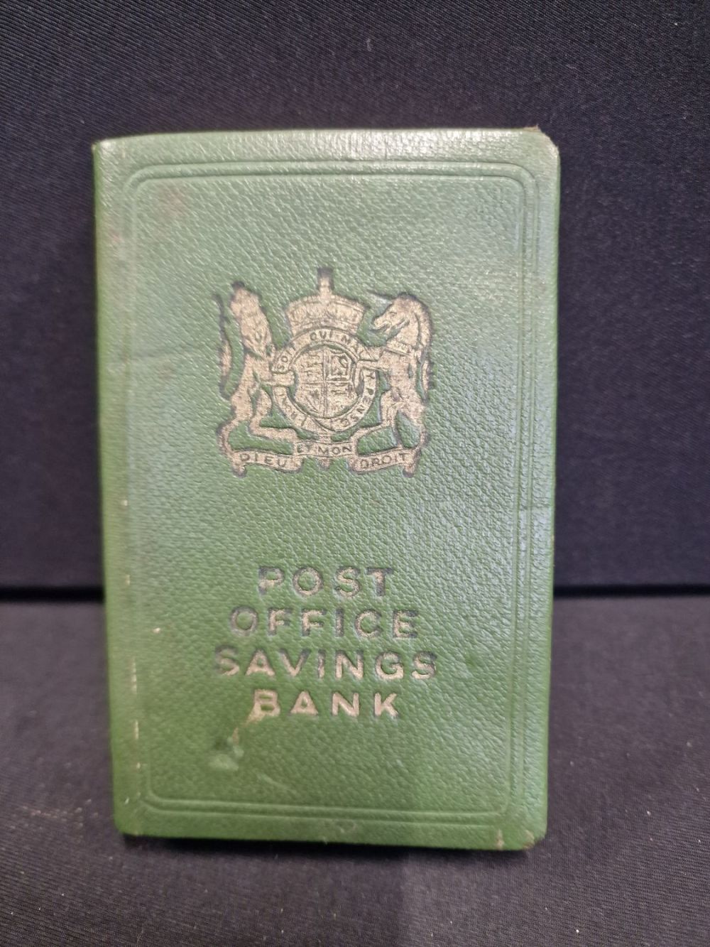 Lot 229: Metal post office savings bank in the shape...