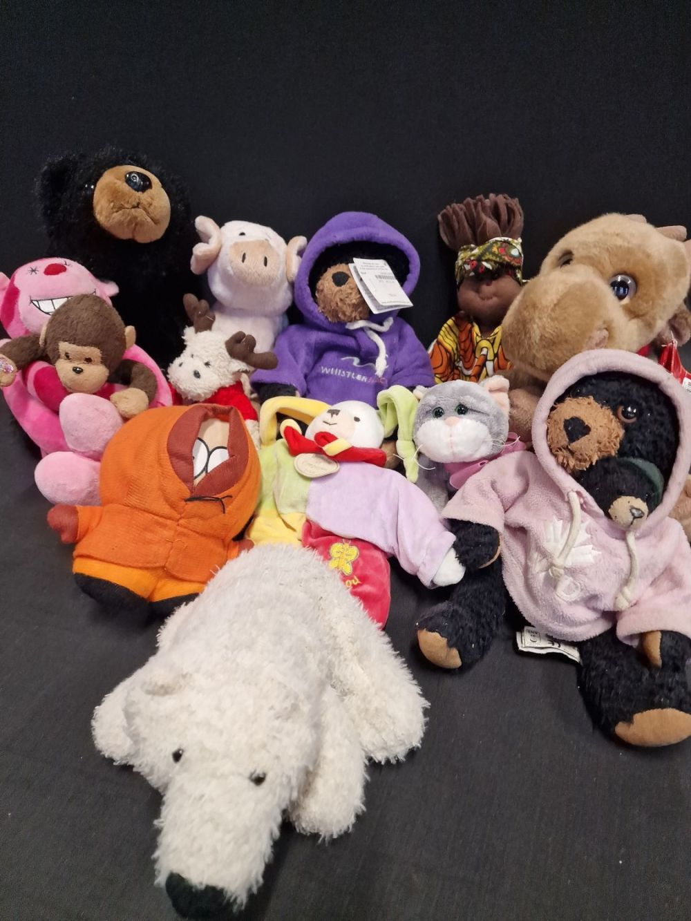 Lot 245: A selection of soft plush including Kenny from...