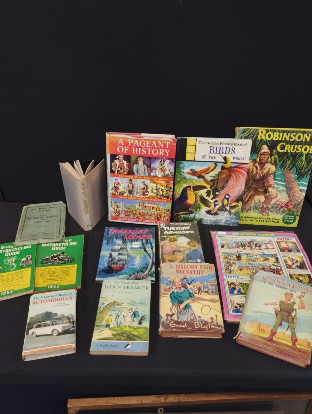 Lot 275: Selection of Vintage Books and Cartoon Express Pages.