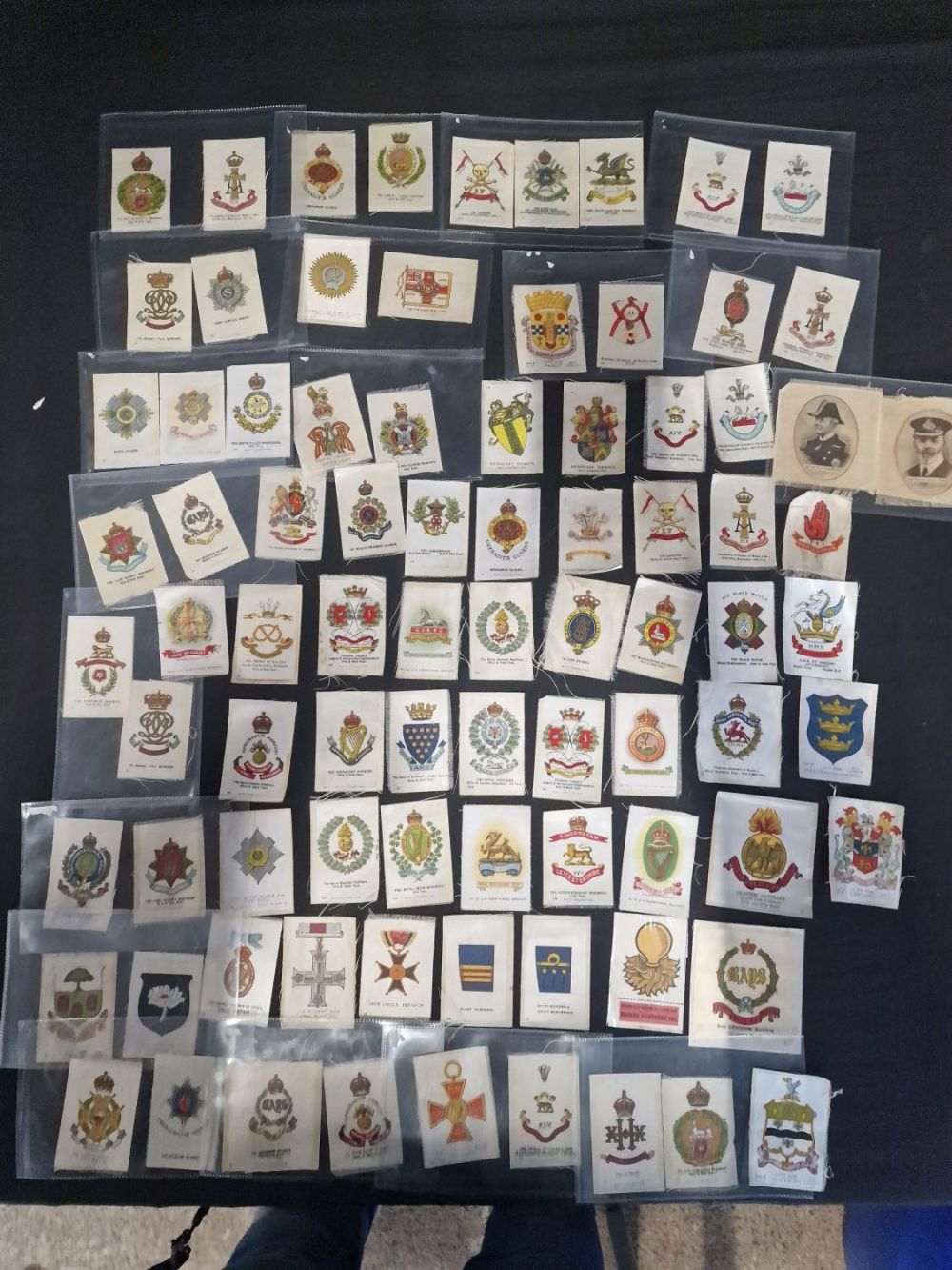 Lot 294: A.large collection of Regimental / military cigarette silks....