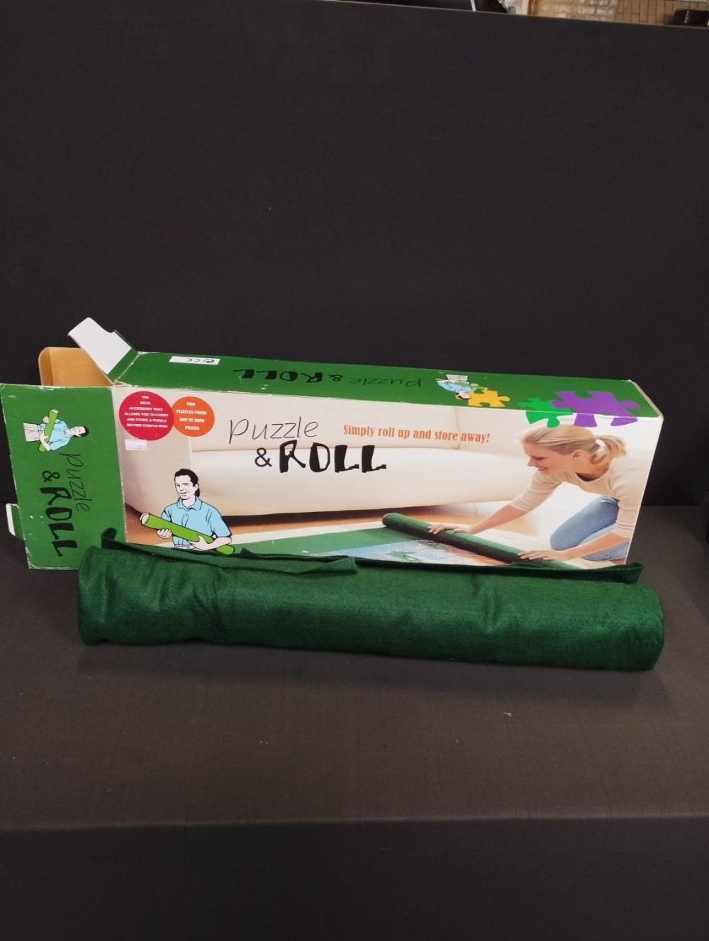 Lot 319: Puzzle and Roll Jigsaw Roll Away Mat.