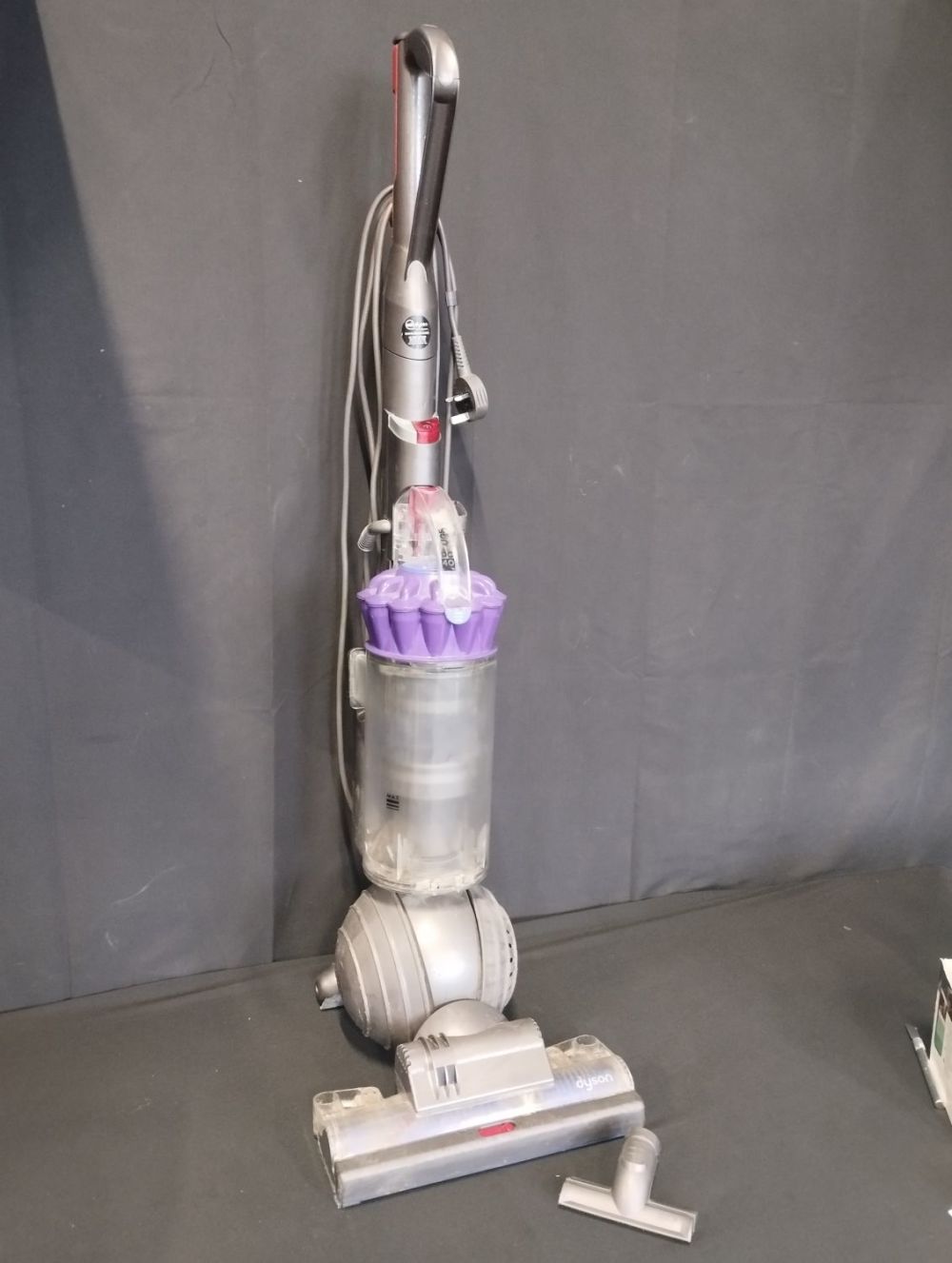Lot 325: Dyson DC40 Rollerball Upright Vacuum with Accessories. Tested...
