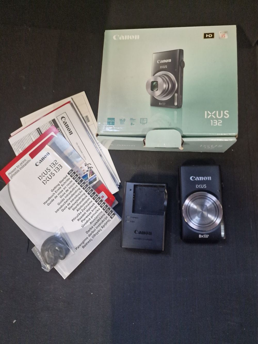 Lot 353: A Canon IXUS 132 like new and boxed