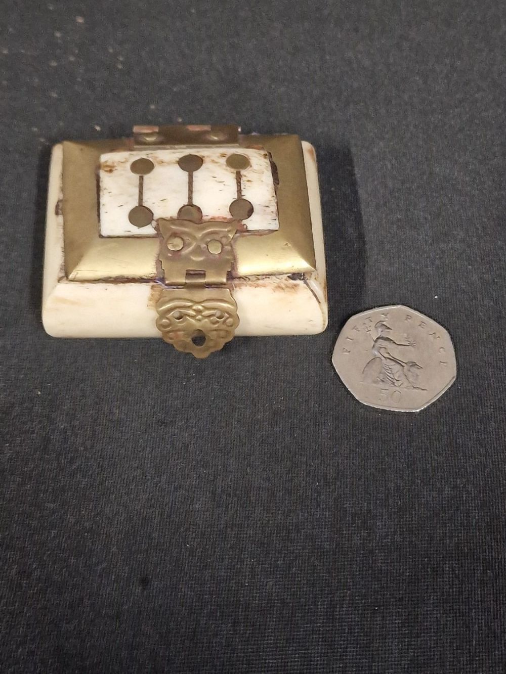 Lot 380: A vintage ornate bone trinket box with velvet...