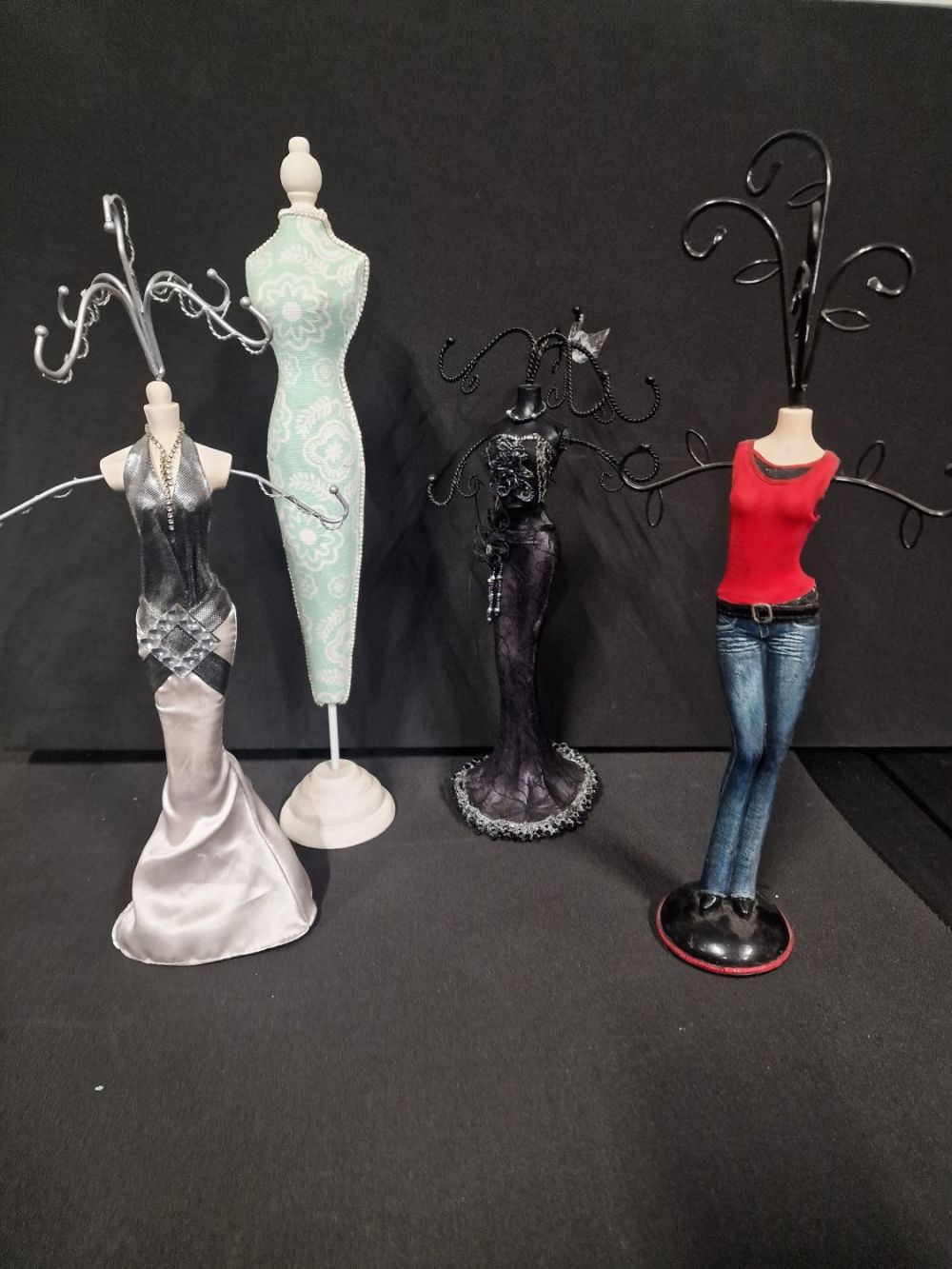 Lot 383: Four Jewellery mannequin stands