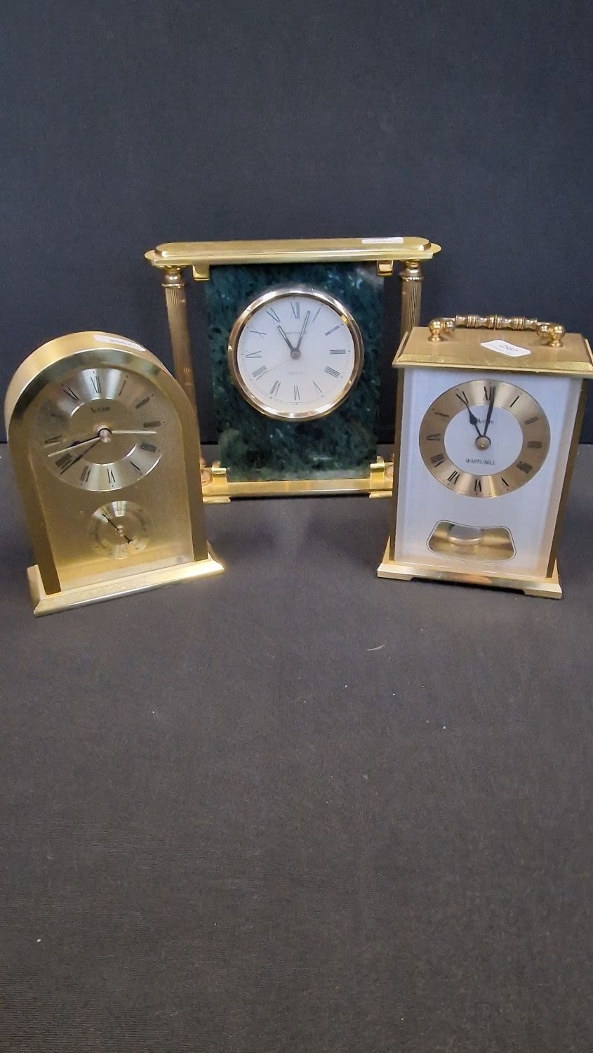 Lot 54: Three vintage brass mantle & Carriage clocks. All...