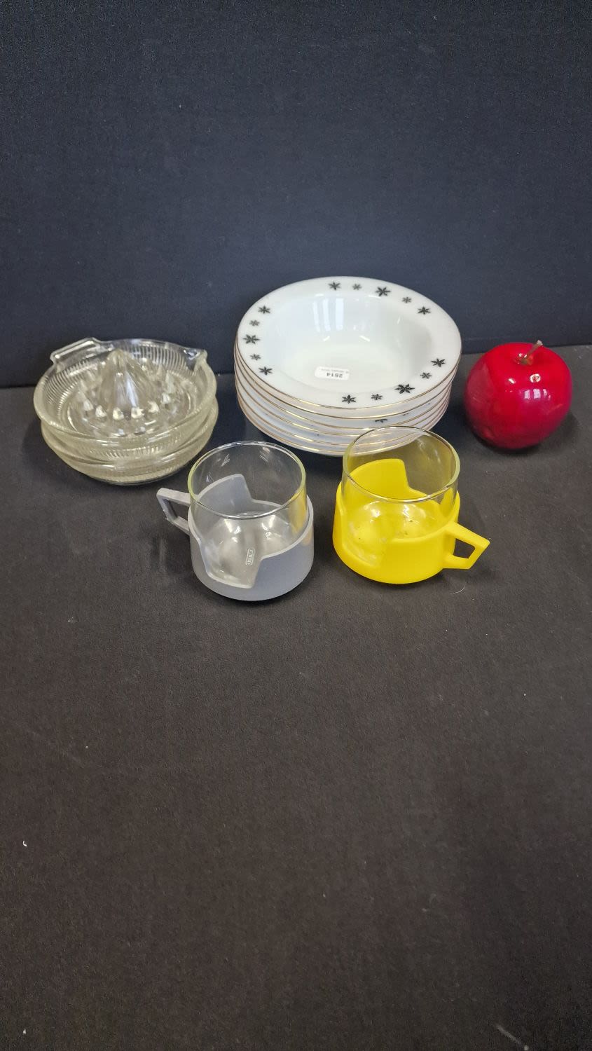 Lot 56: A collection of vintage glass kitchen ware. Two...