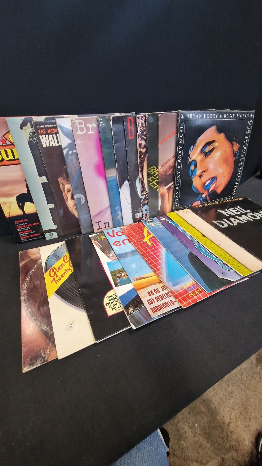 Lot 58: Approximately 23 LP albums. Includes Bryan Ferry, ActionTrax...