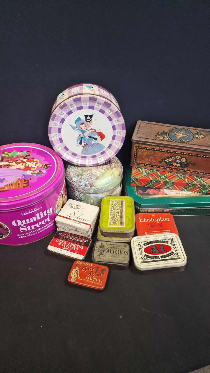 Lot 63: A collection of vintage tins. Incudes Quality Streets...