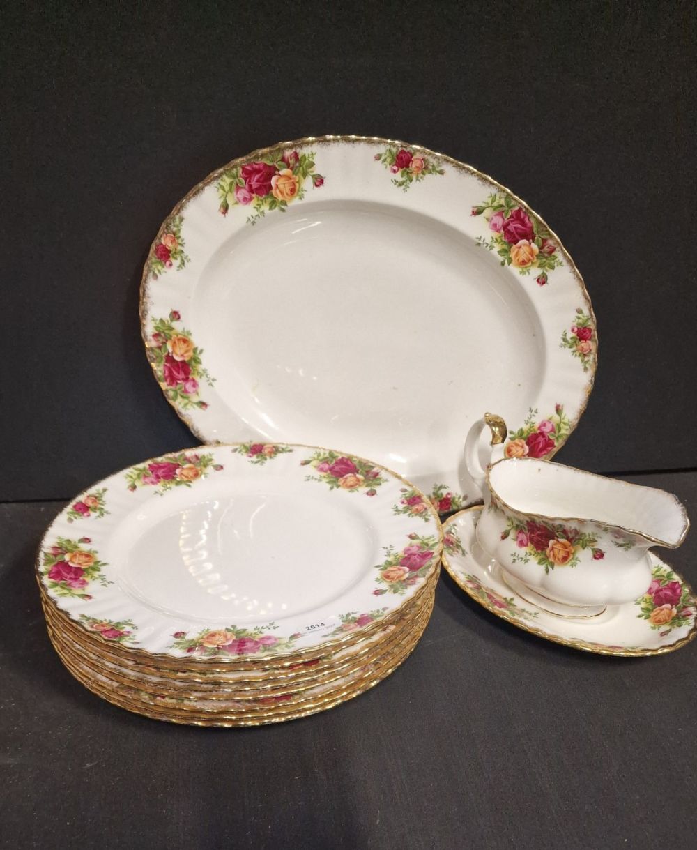 Lot 105: Royal Albert Old Country Rose service. Includes 8...