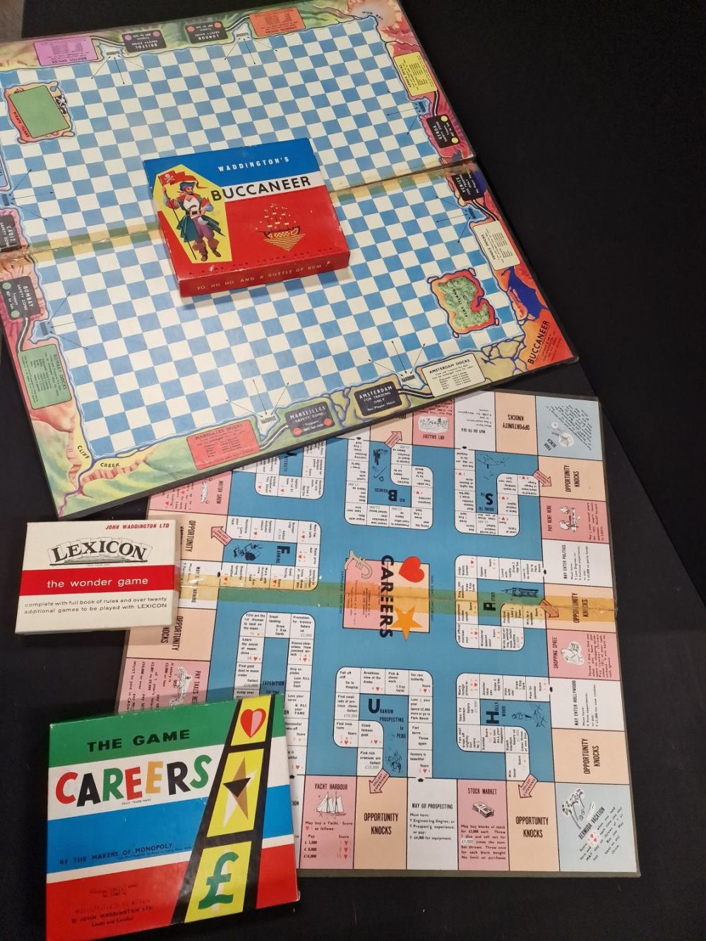 Lot 190: Three vintage board games. Includes Buccaneer, Careers and...