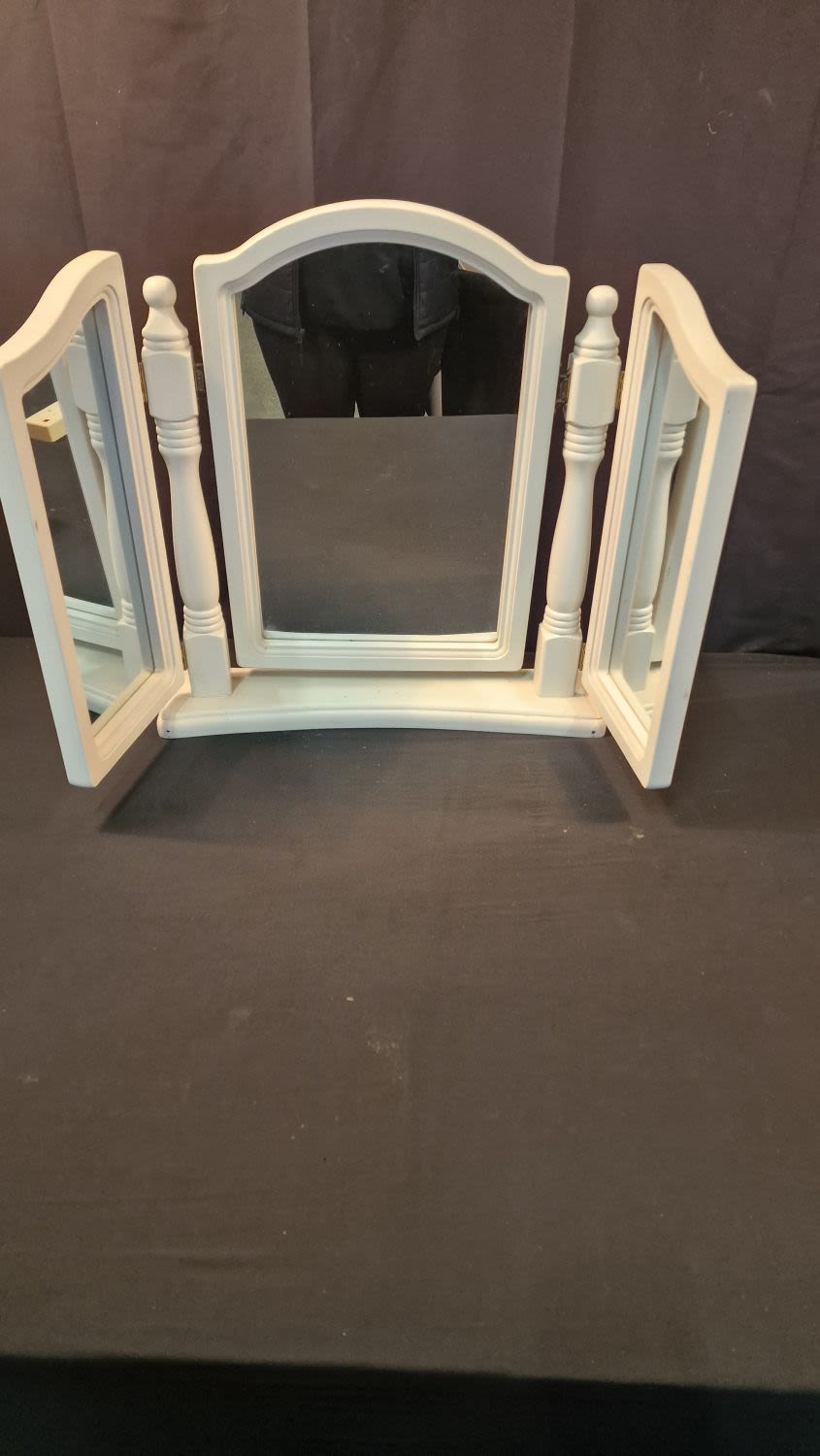 Lot 198: A cream solid wood Triptish vanity mirror in...