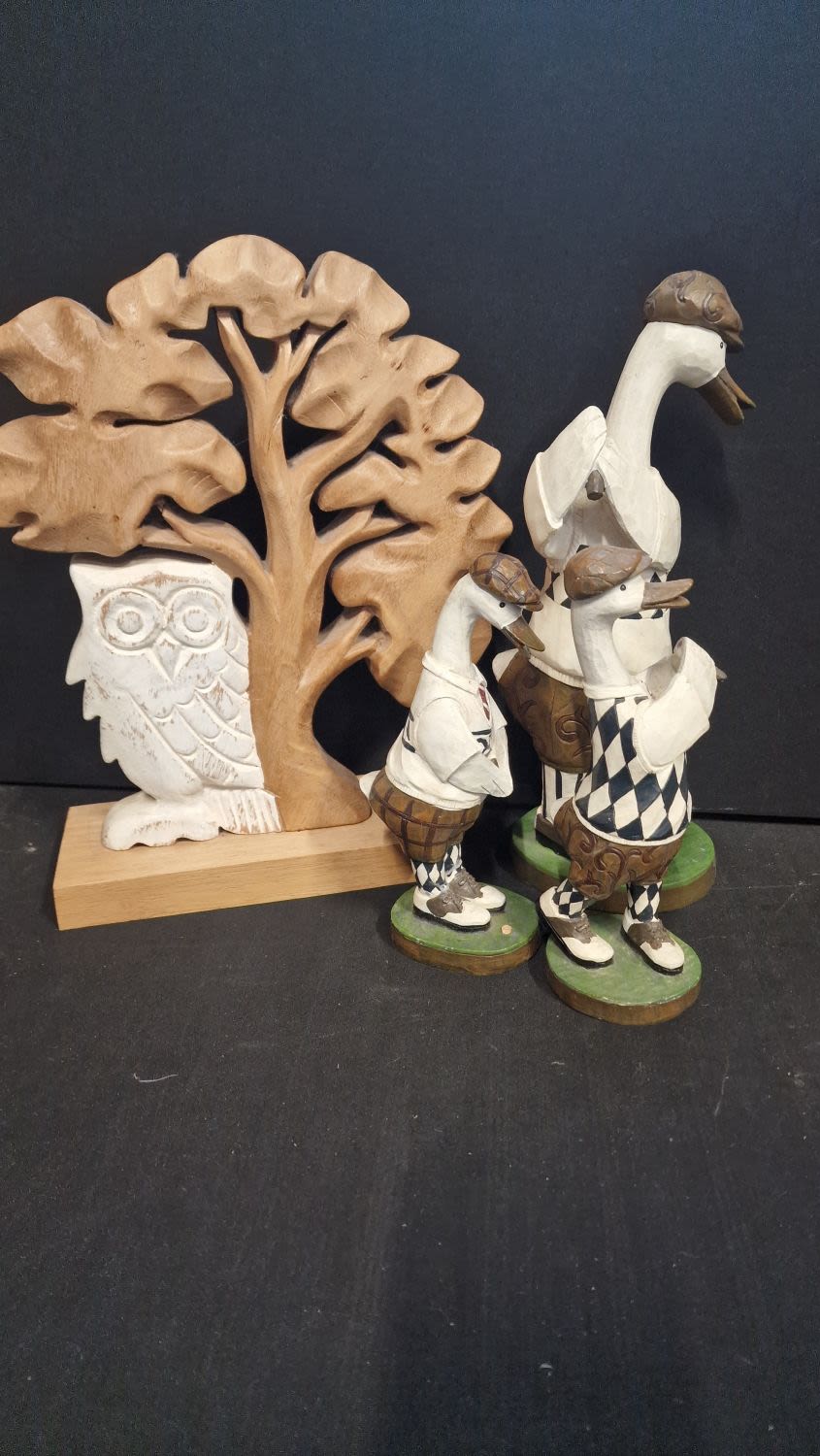 Lot 215: A selection of wooden home ware including three...