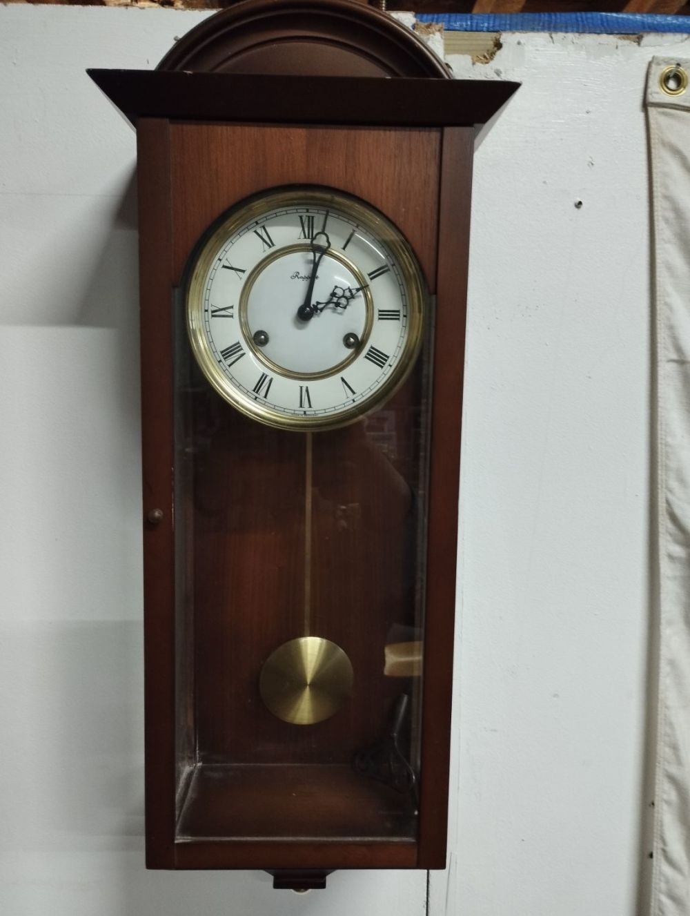 Lot 219: Rapport Mahogany wall Clock with Pendulum and Key...