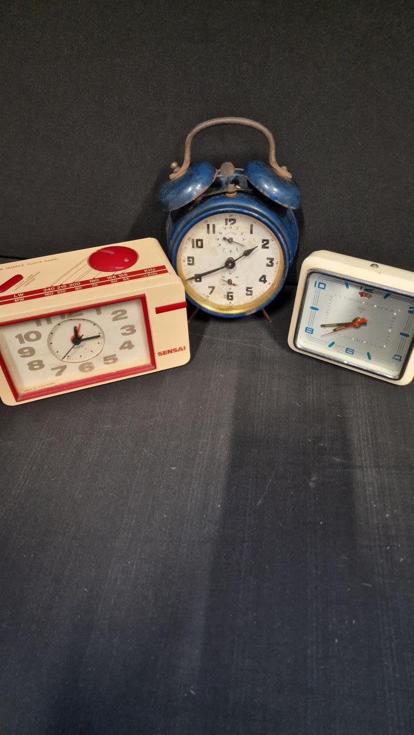 Lot 220: Three vintage alarms clocks.