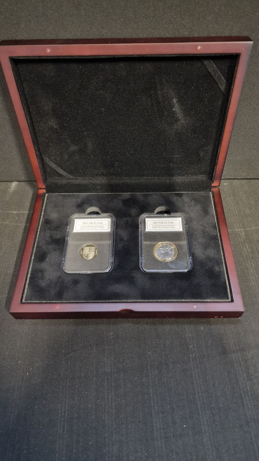 Lot 271: Two uncirculated 2015 certified brilliant £1 and £2...