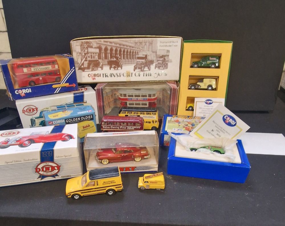 Lot 280: A collection of corgi and dinky trucks, buses...