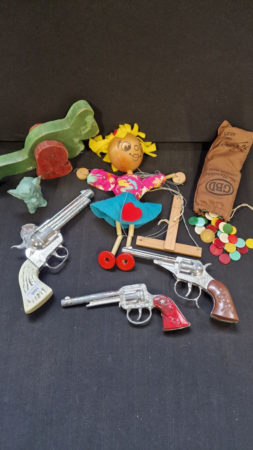 Lot 336: A selection of vintage toys. Including wooden puppet,...