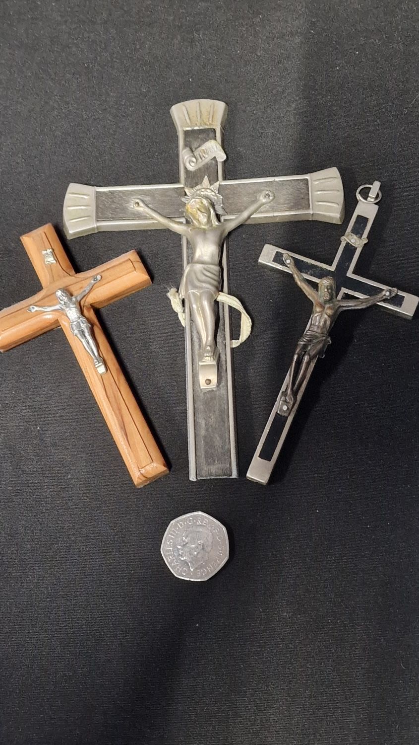 Lot 52: Three vintage metal and wooden crucifixes.