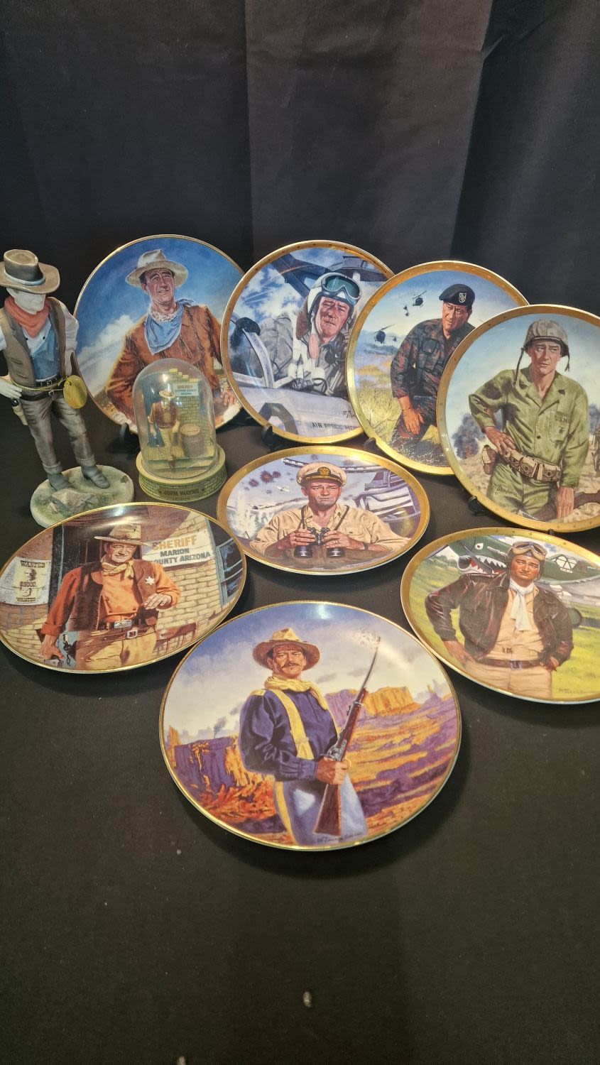 Lot 58: John Wayne collectors lot. Includes two kohn Wayne...