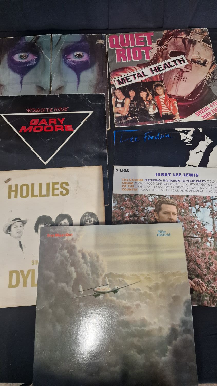 Lot 61: A selection of 12 Vinyl LP records includes...