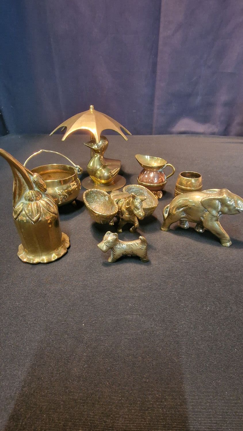 Lot 67: An assortment of miniature brasses.