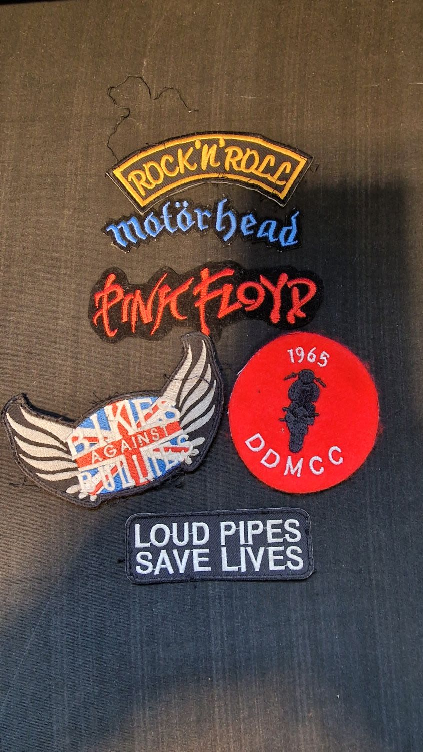 Lot 87: A collection of biker and music patches. Includes...
