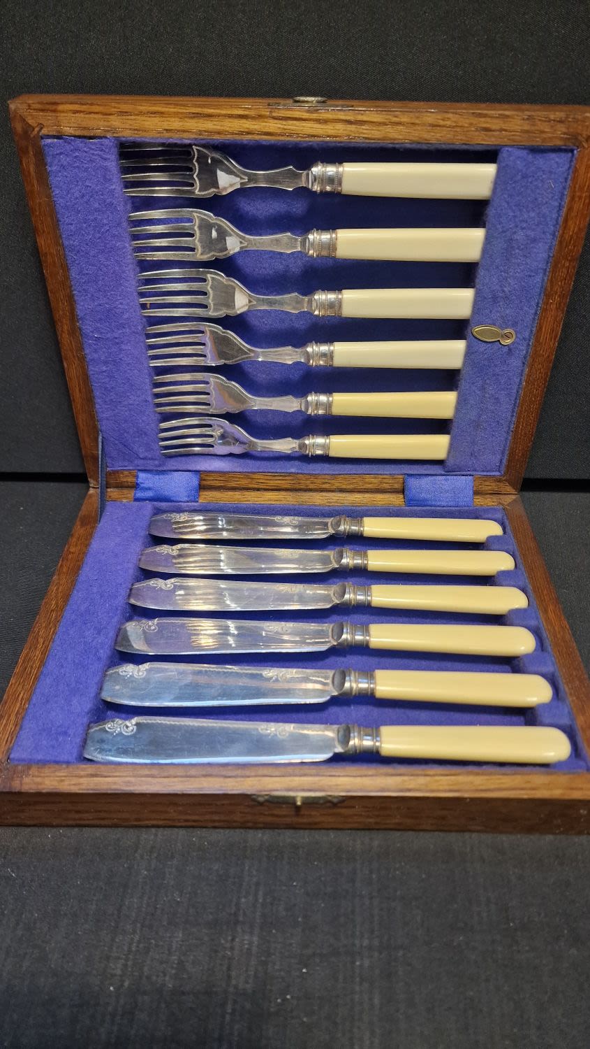 Lot 90: A Canteen fish knife and fork set