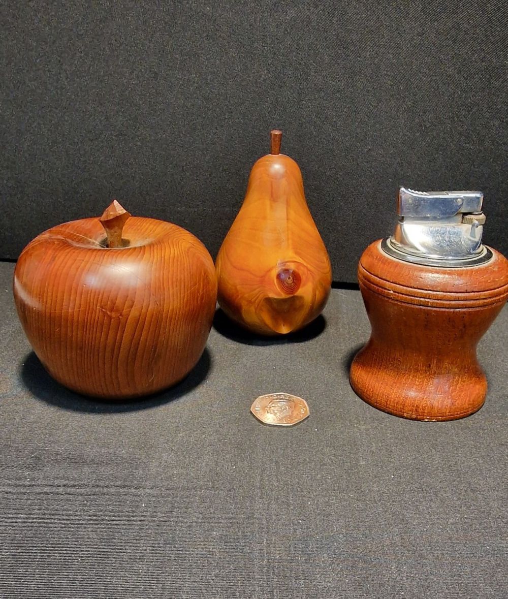 Lot 91: A three piece hand turned set. Yew wood...