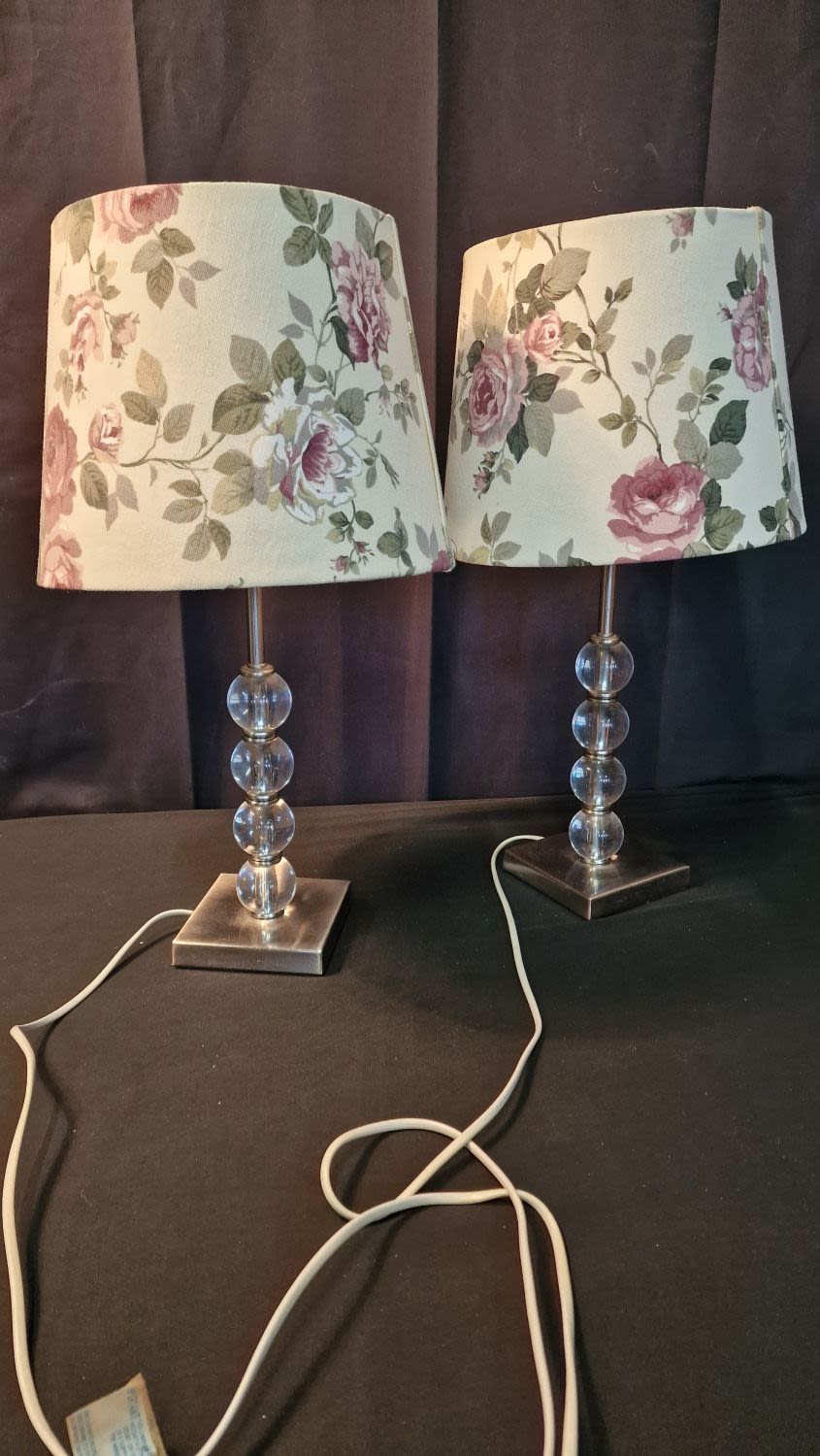 Lot 108: Two vamp table lamps. Working