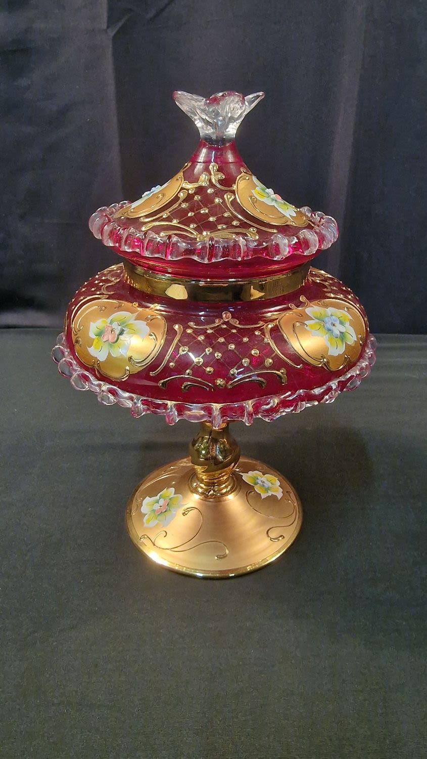 Lot 242: A stunning piece of cranberry glass with gold...