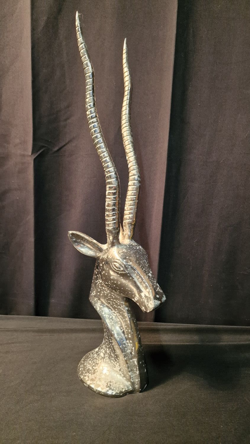 Lot 248: A white metal Gazelle. Approximately 52cm H