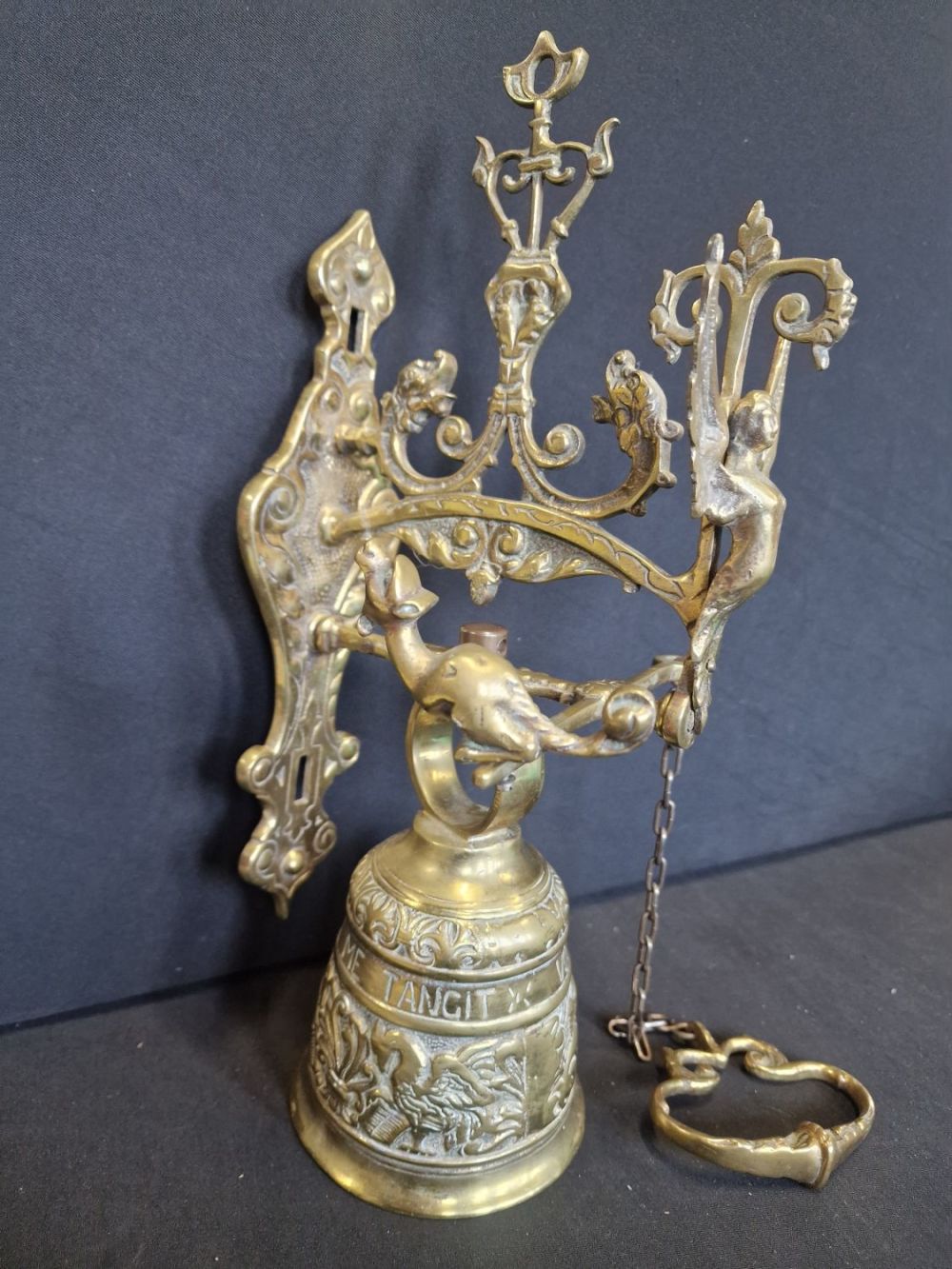Lot 260: A large wall mounted brass pull handle monastry...