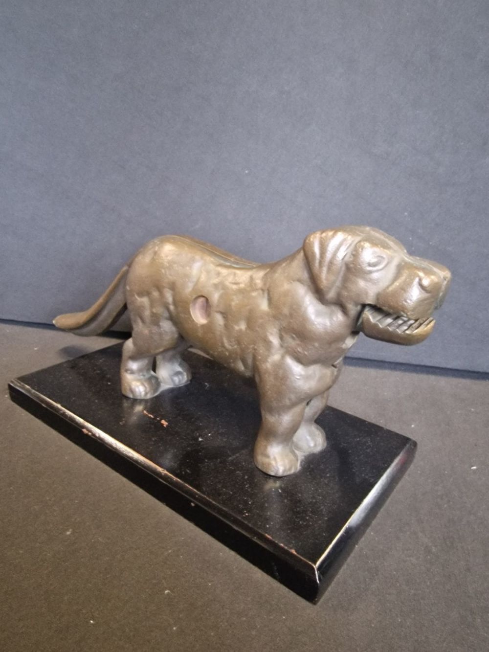 Lot 268: A Vintage mounted dog nut cracker.