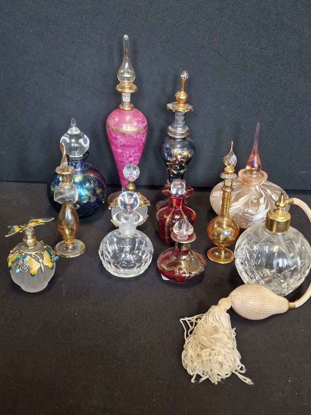 Lot 311: A beautiful collection of vintage perfume bottles. Hand...