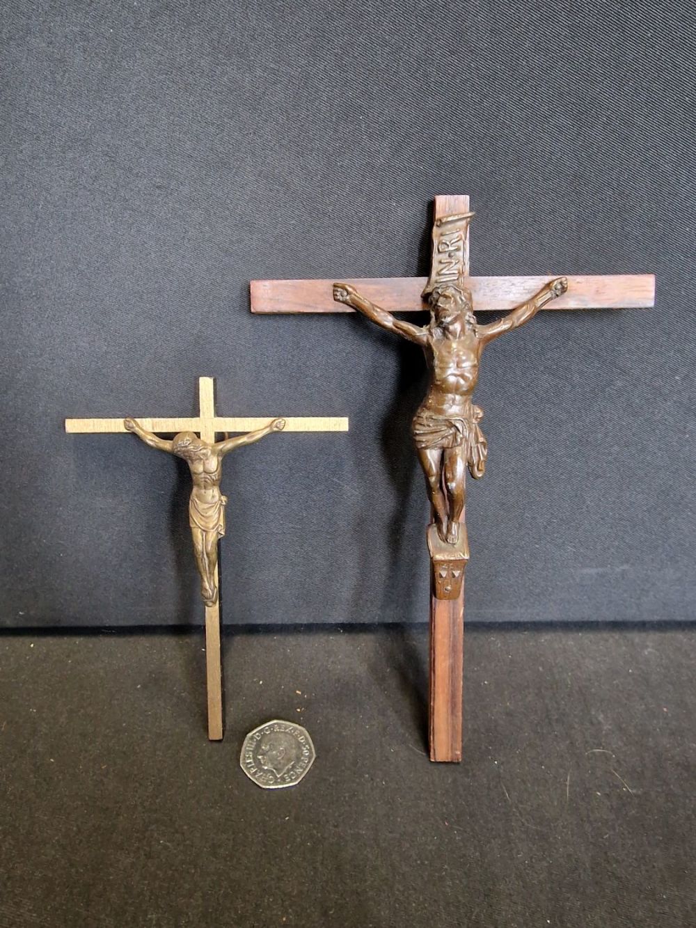 Lot 312: Two wall mounted wood and metal crucifix