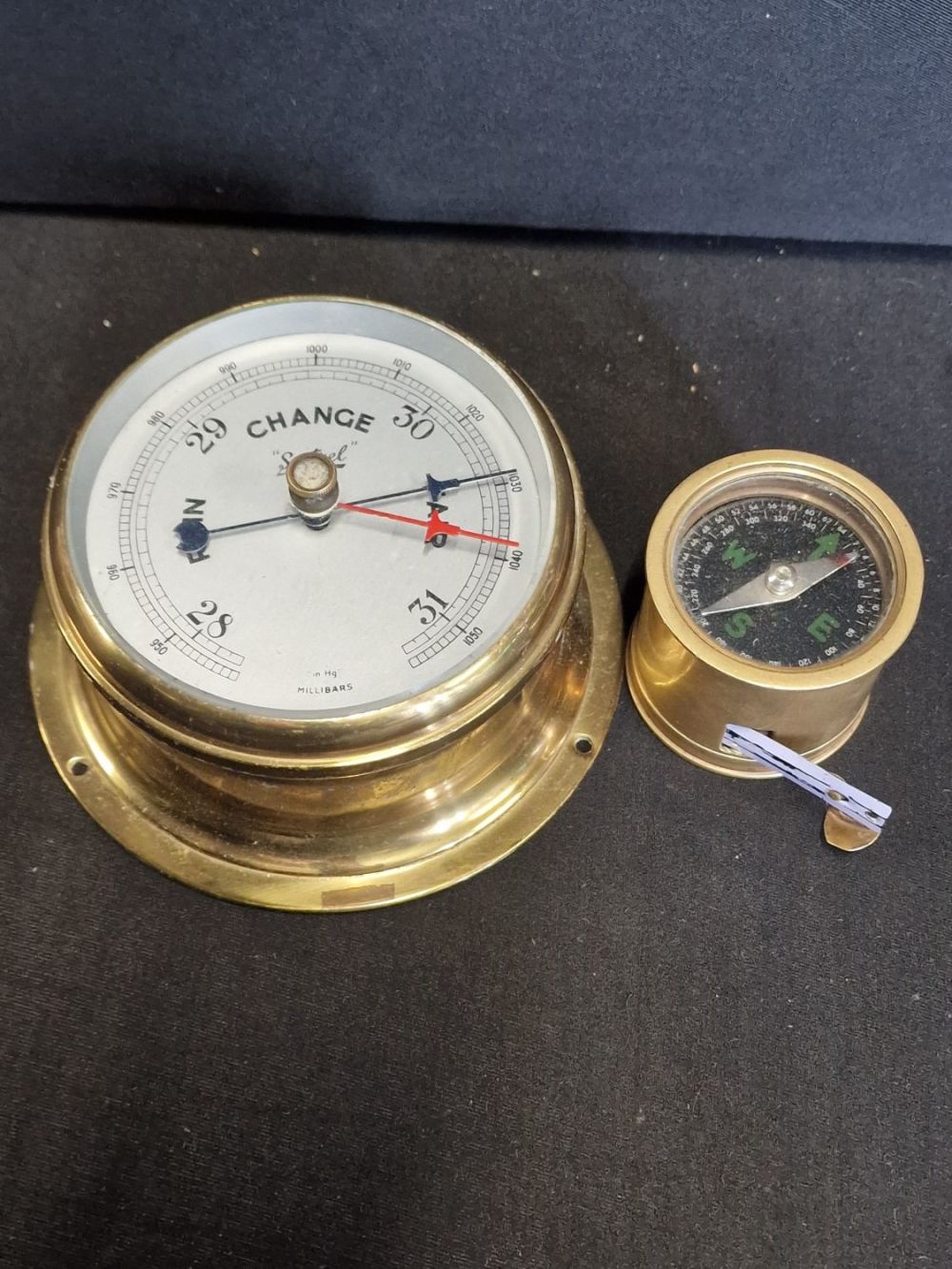 Lot 315: A vintage Sestrel Millibars brass Barometer and a...
