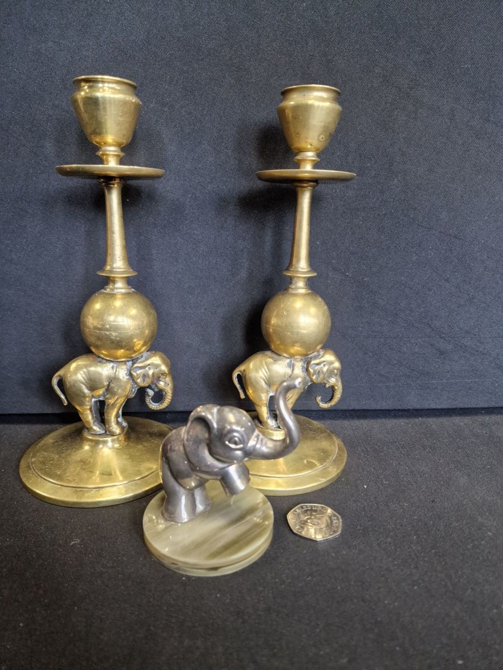 Lot 327: Two brass elephant candle sticks ans white metal...