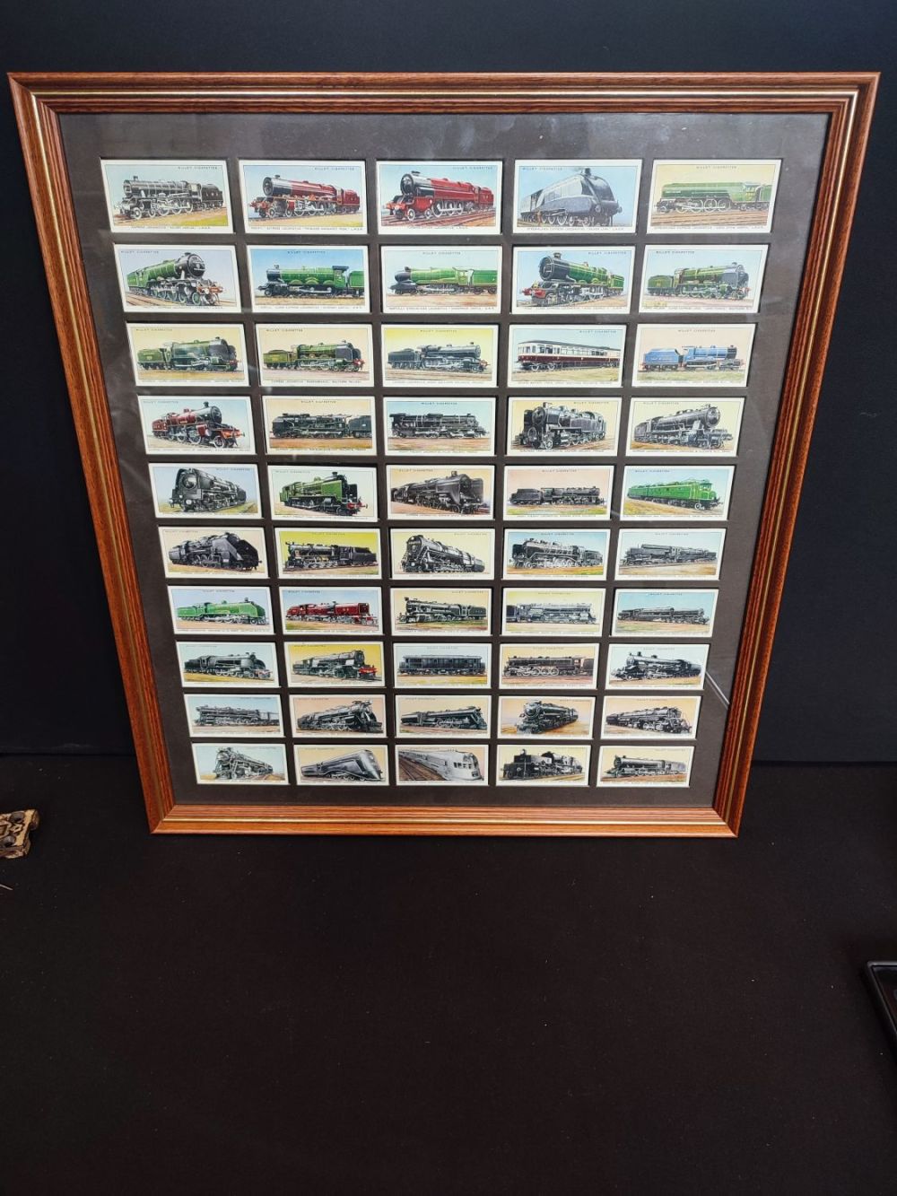 Lot 335: 50 train Cigarette Cards Mounted in double sided...