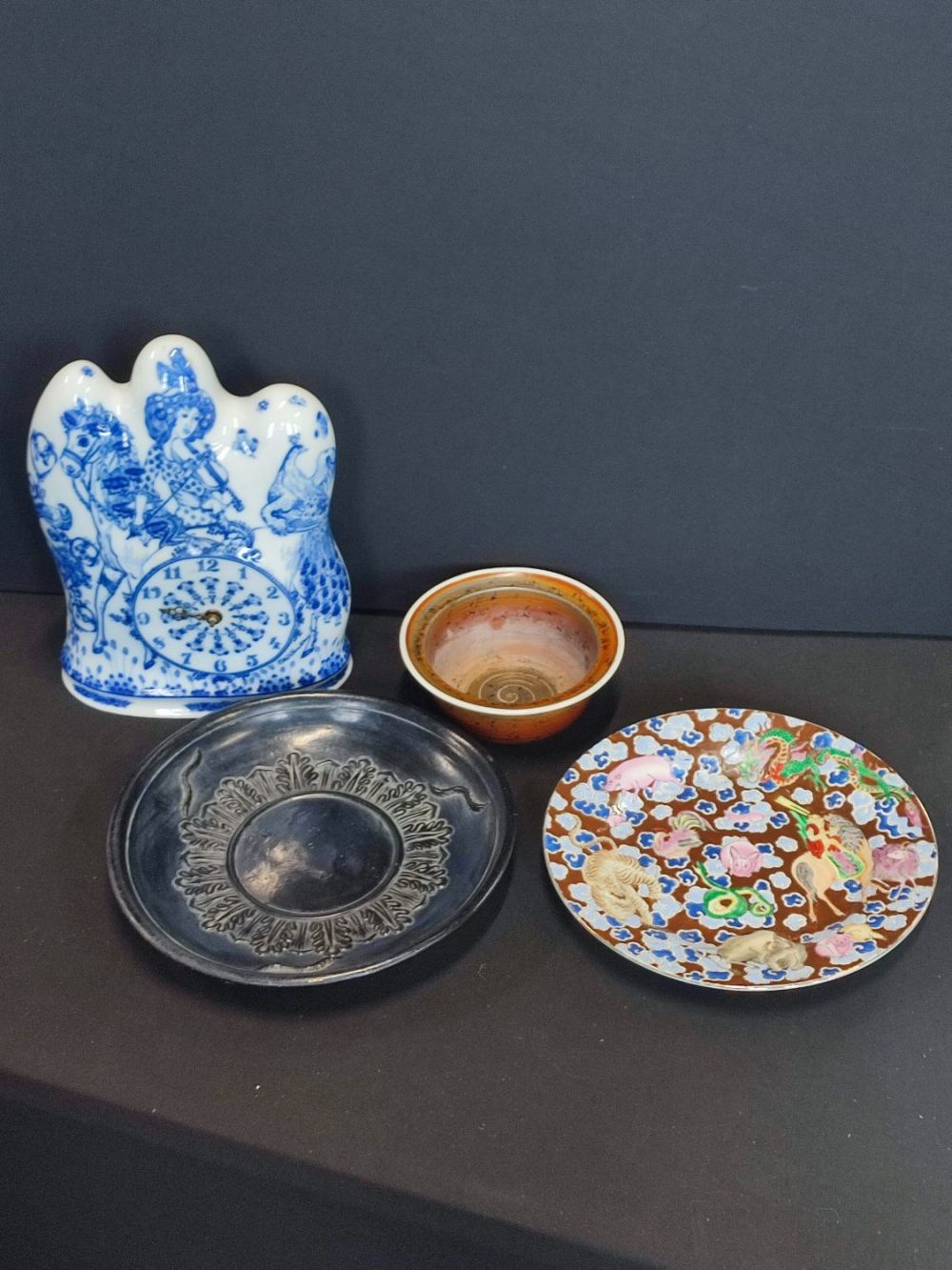 Lot 344: Hutschenreuther porcelain clock, black stoneware dish, Stig Lindberg...
