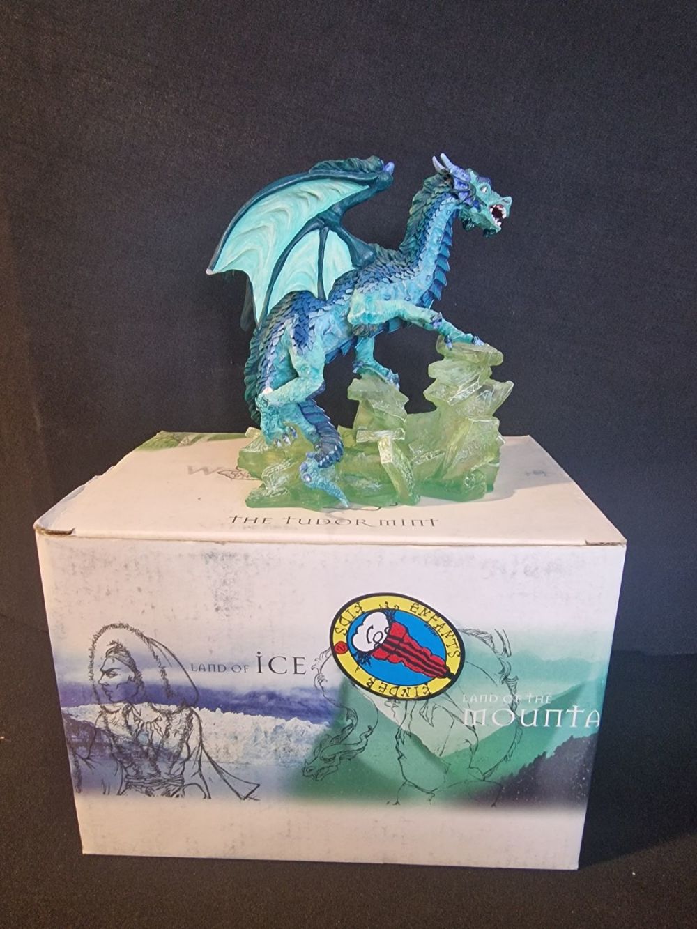 Lot 168: LAND OF THE DRAGONS by Tudor Mint. Small...