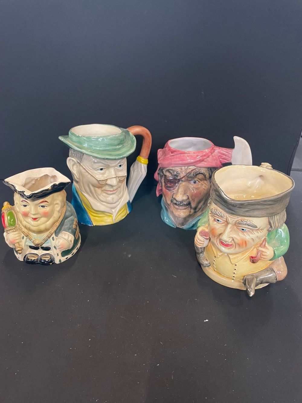 Lot 172: Selection Of Large Character Jugs