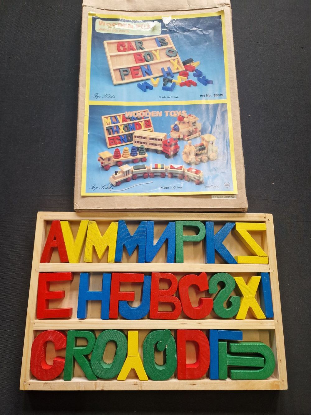 Lot 175: A vintage wooden alphabet toy
