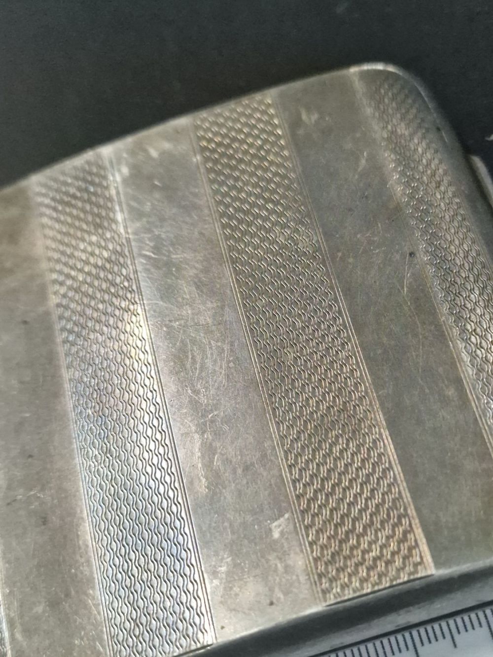 Lot 217: A solid sterling silver cigarette case.
