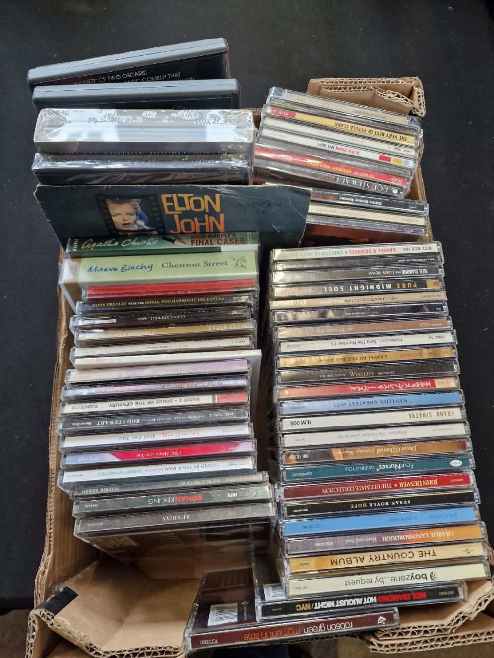 Lot 226: A collection of CDs and DVDs