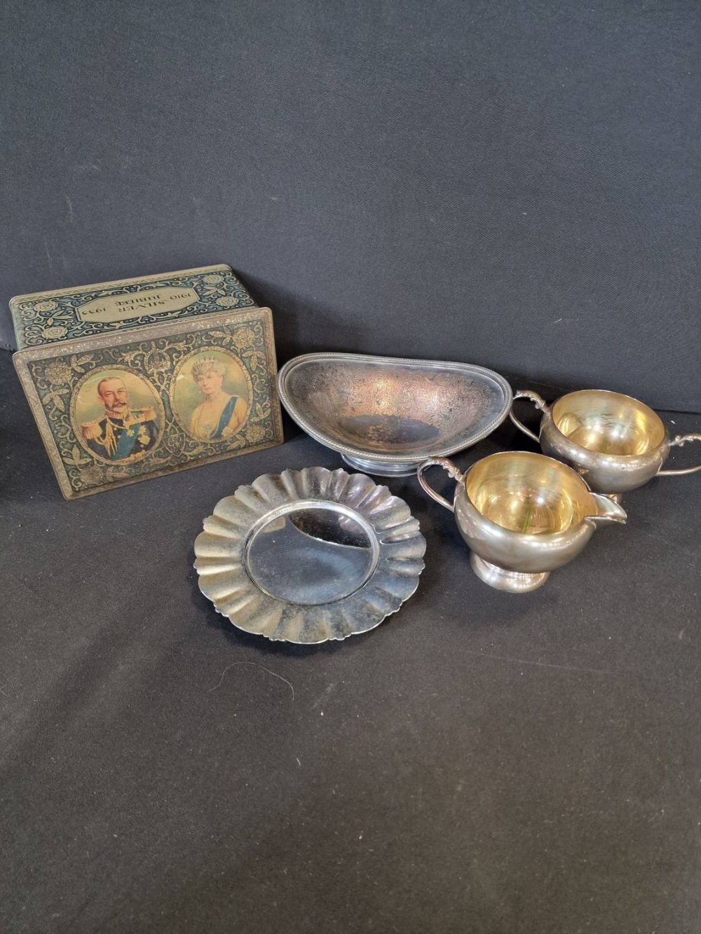 Lot 231: A collection of silver plate by E.Cooper and...
