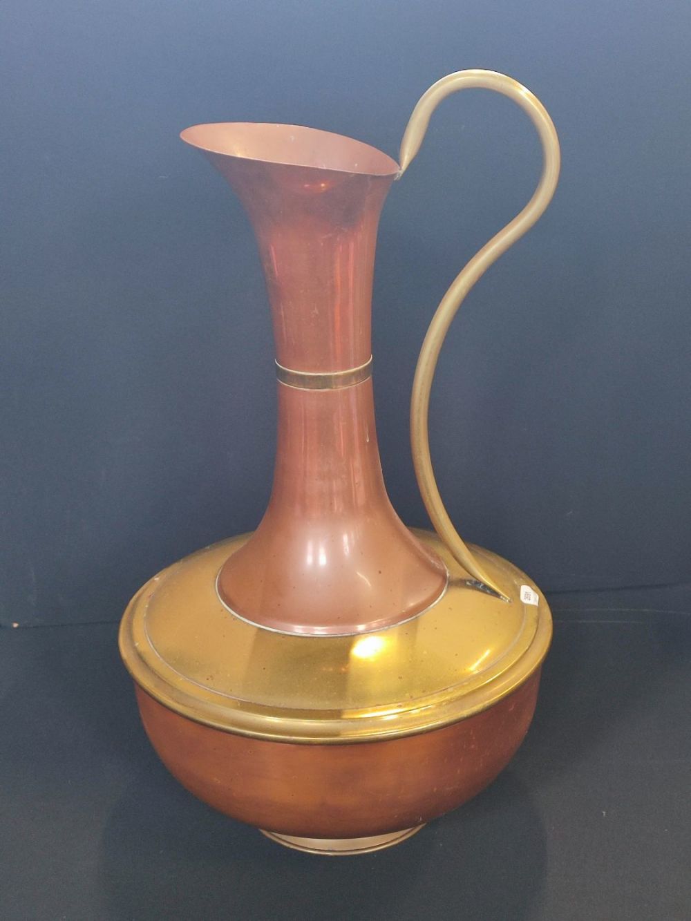 Lot 249: Large copper and brass pitcher, approximately 45cm tall
