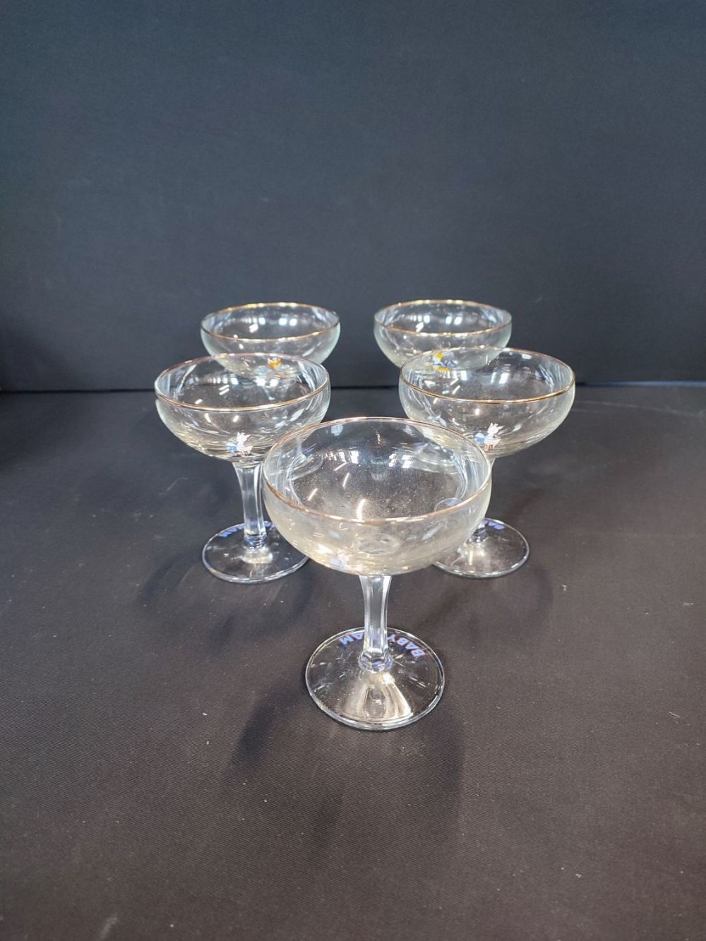 Lot 264: 3 1950s and 2 1970s babycham glasses
