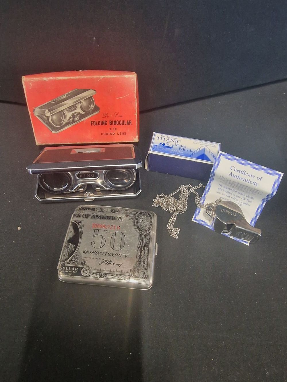 Lot 310: A pair of vintage folding binoculars. Titanic mates...