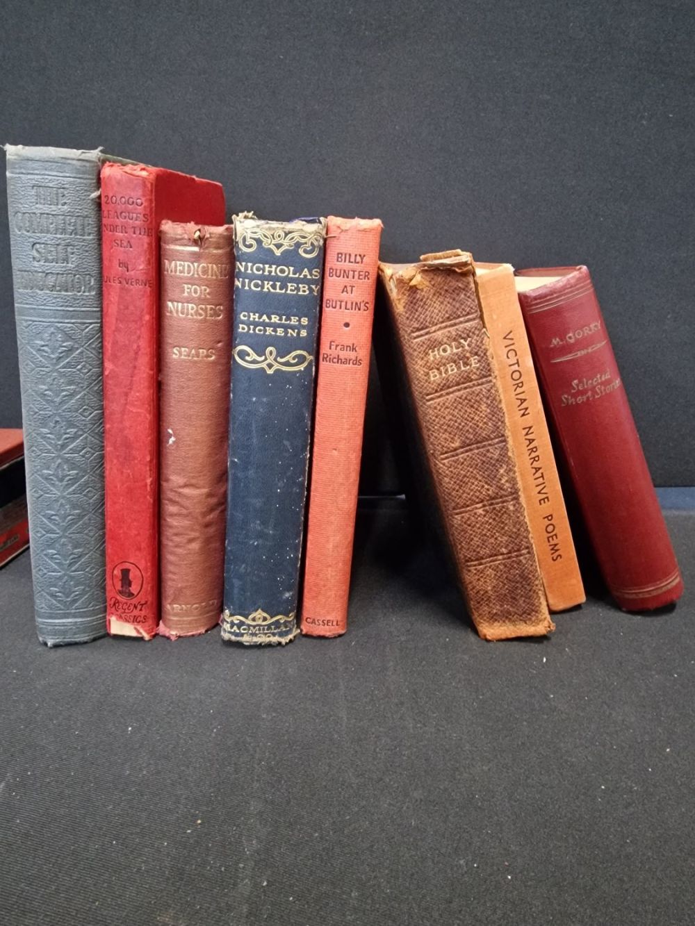 Lot 322: A collection of vintage hard back books. Includes...
